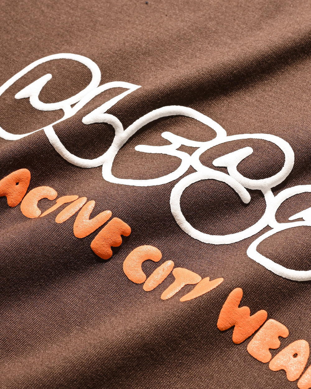 CLESSTE / Bubble Logo Print Massive T-Shirt With Drawstrings (Brown)