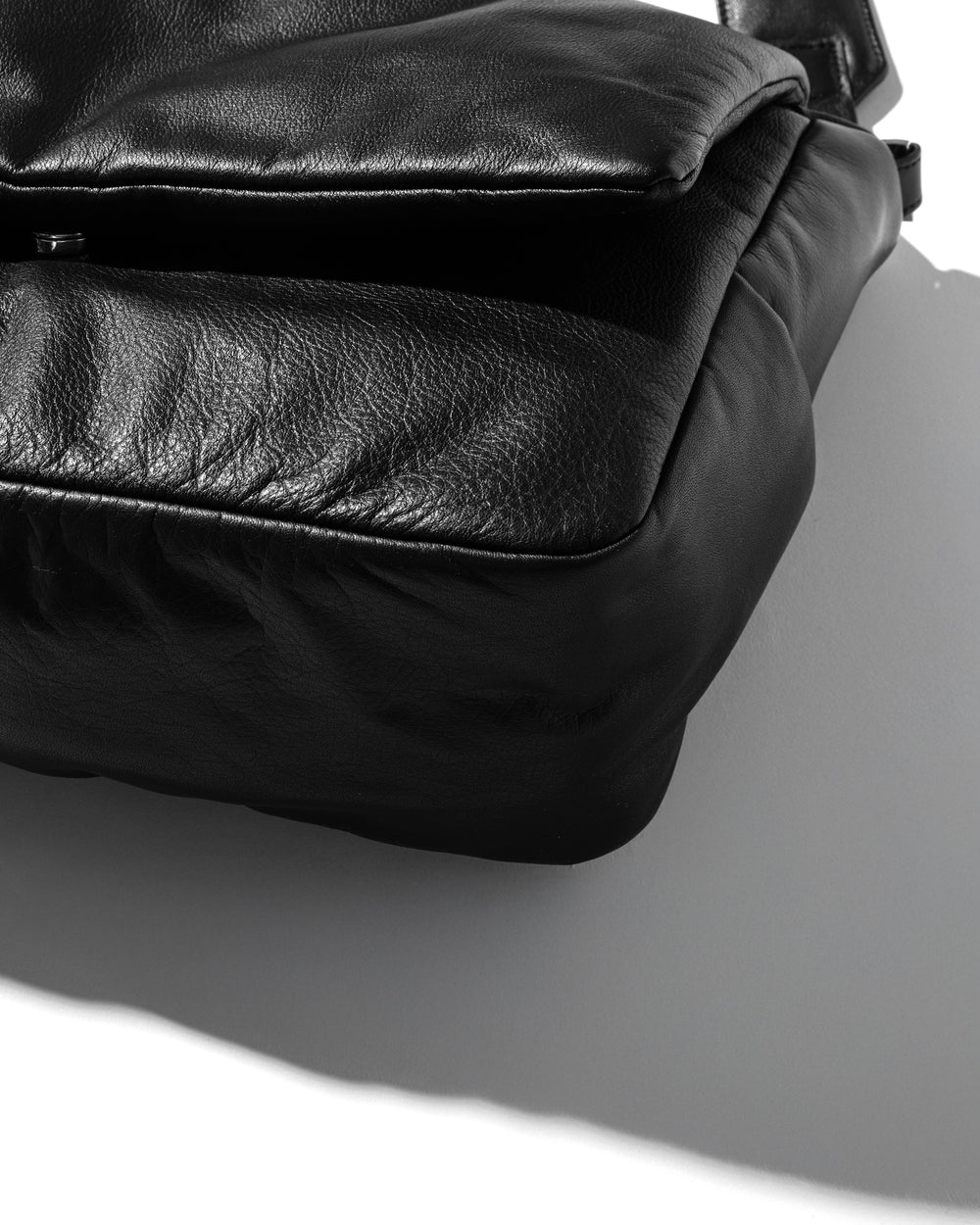 CLESSTE / Leather Padded Flap Holiday Bag