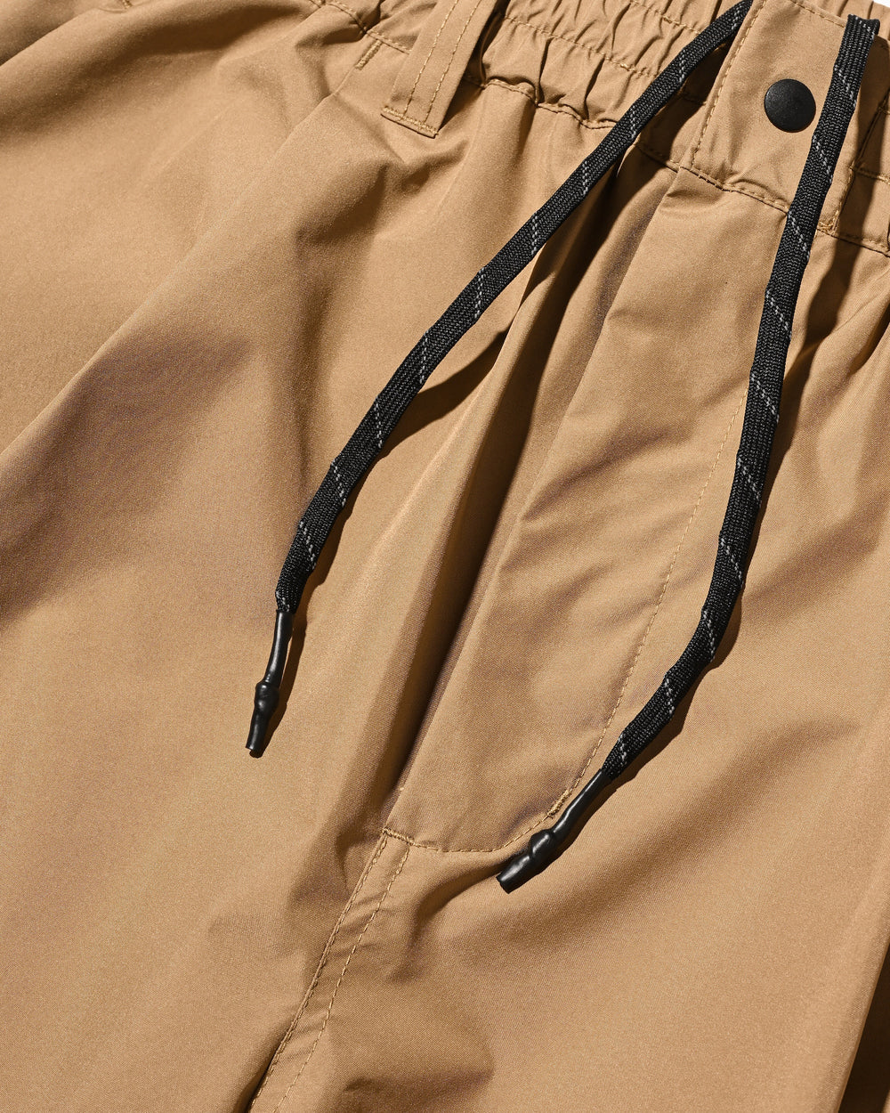 CLESSTE / +Phenix Windstopper ® By Gore-tex Labs City Barrel Leg Pants (Camel Beige)