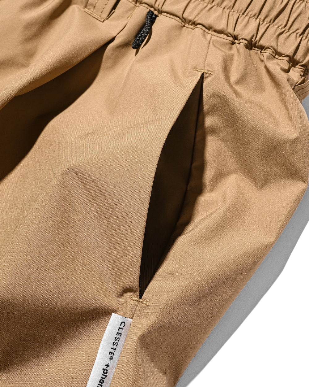 CLESSTE / +Phenix Windstopper ® By Gore-tex Labs City Barrel Leg Pants (Camel Beige)