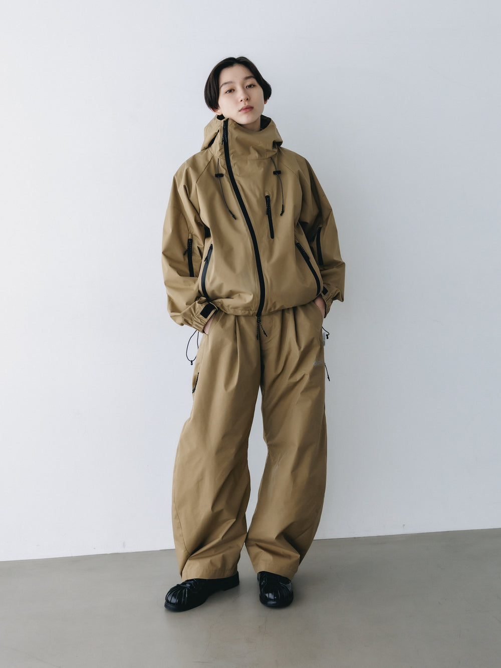 CLESSTE / +Phenix Windstopper ® By Gore-tex Labs City Barrel Leg Pants (Camel Beige)