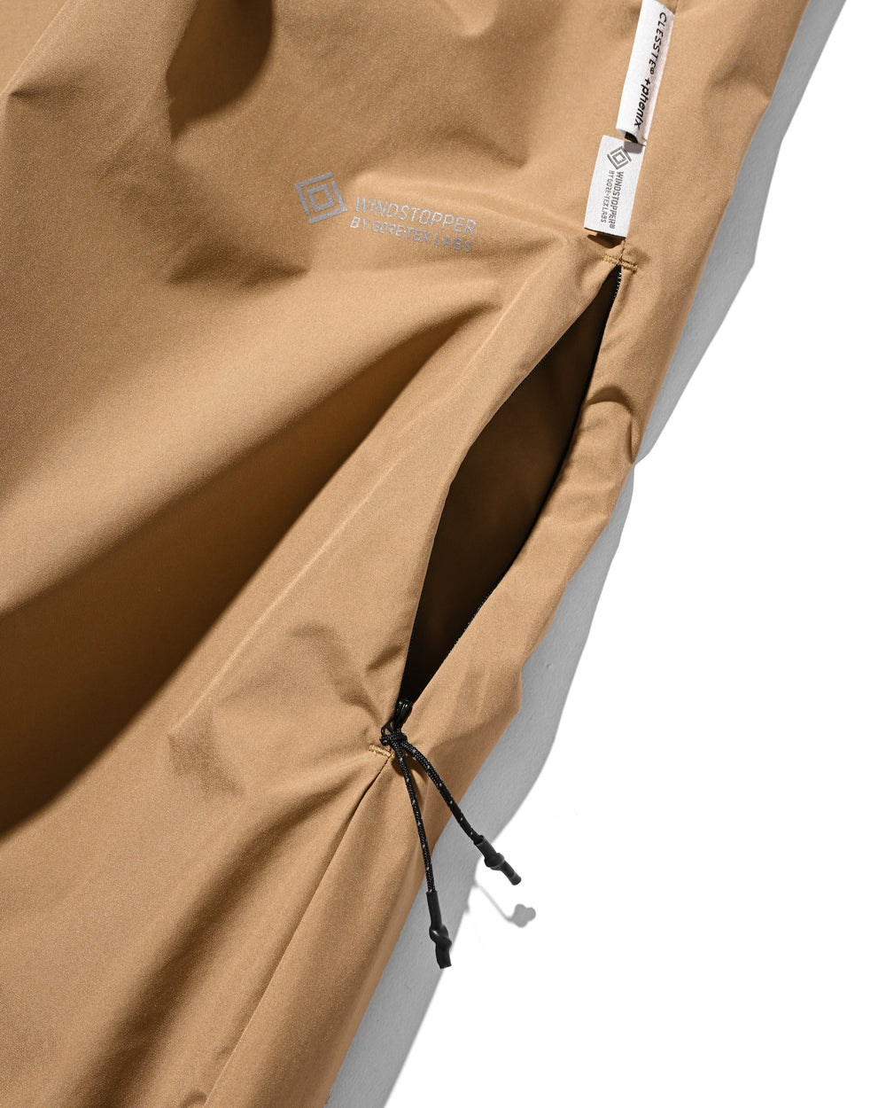 CLESSTE / +Phenix Windstopper ® By Gore-tex Labs City Barrel Leg Pants (Camel Beige)